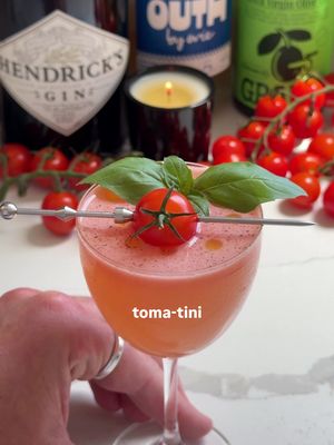 Who wants a toma-tini? 🍅 Tomato girl summer is here, which means it’s officially time to bring this savory little cocktail back. I first tried this recipe from my friend @evie a few summers ago, and it’s been in my rotation ever since. If you’re into a dirty martini with a fresh twist, this is definitely one to try. Ingredients (per serving): — 5 cherry tomatoes — 1 bar spoon of lemon juice — 1 bar spoon of champagne vinegar — pinch of salt — .5 oz dry vermouth — 2.5 oz gin — garnish: olive oil, black pepper, cherry tomato, fresh basil Muddle together cherry tomatoes, lemon juice and champagne vinegar until tomato juices are released. Add muddled mixture, salt, vermouth and gin into a cocktail shaker with ice — shake until cold. Double strain into a martini glass. Garnish with drops of olive oil, ground black pepper, fresh basil and a cherry tomato. Enjoy! *I doubled the ingredients in the video shown* #tomatococktail #tomatini #tomatomartini #tomato #cocktail