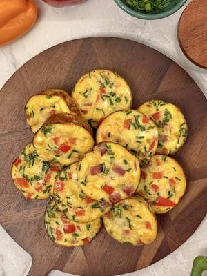 Back-to-school breakfast hack: ask for your ham sliced "dinner cut" at the deli, then cube it for egg muffins that make busy mornings so much easier. 🍳 Ham and Cheese Egg Muffins: 👉 Boar's Head® Maple Glazed Honey Coat® Ham 👉 Boar's Head® Vermont Cheddar Cheese 👉 6 large eggs 👉 Red bell pepper, diced 👉 Fresh chives, chopped 👉 2 tablespoons milk 👉 Salt and black pepper 👉 Butter or cooking spray for the tin #BoarsHead #Foodie #Deli #EggMuffins #BackToSchool