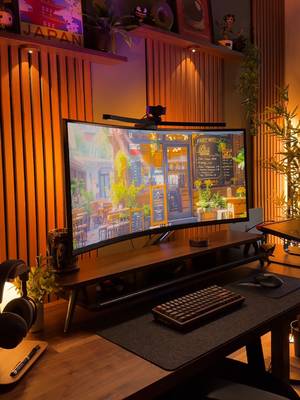 Cozy lights, cozy desk vibes 🌇 Love how warm light looks a bit orangy on the wooden panels — that's definitely my favorite, the one I use the most. But I also like throwing in a different accent light here and there for a bit of contrast 💡 #desksetup #cozysetup #cozygamingsetup #setupinspiration #aestheticsetup