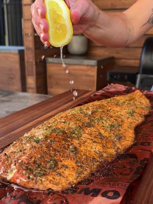 5 Ingredient Weeknight dinner🔥 This Garlic Salmon goes from prep to plate in about 30 minutes, with a simple garlic, parsley, and olive oil mixture and plenty of wood-fired flavor. Ingredients: • 1 (2–3 lb) skin-on salmon fillet • Traeger Fin & Feather Rub, to taste • 1/4 cup olive oil • 2 tbsp minced garlic • 1/2 tbsp fresh minced parsley • Lemon wedges, for serving That’s it. Easy enough for a weeknight, good enough to make it into the regular rotation. Ready to fire it up? Head to Traeger.com for the full step-by-step recipe, or save and open Garlic Salmon directly in the Traeger App. #Traeger #TraegerGrills #Traegerhood #TraegerRecipes #Salmon #GarlicSalmon #WeeknightDinner #EasyDinner #WoodFiredFlavor #Grilling
