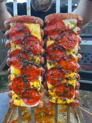 Hot Honey Pizza Sausage Skewers Recipe 👇 Recipe: Servings: 4 people Prep: 20 minutes Cook: 15 minutes Red Sausage Pizza: 8-10 Italian Sausages ¼ cup of Mozzarella Cheese 3-4 tbsp of Pizza Sauce 5-6 Sliced Pepperoni 3-4 Basil Leaves Hot Honey Butter: 1.5 cup Unsalted Butter, melted 2 tbsp Local Honey 1.5 tbsp Chopped Parsley 1 tbsp Chili Crisp Instructions Preheat your grill for medium heat (around 350F) making the grill grate or the place where you lay your skewers at least 4 inches away from the heat. It is also helpful to create 2x three zone cooking areas so that the skewers lay between two fires instead of directly over the flames. Begin by carefully skewering your sausage onto a two prong skewer or using two single prongs. Add the skewers to the grill to cook for about 7-9 minutes per side. Make sure to watch out for flare ups, and pull the sausages off or move the coals around it that becomes a problem. Once the skewers are close to their final temperature (165F), begin topping them with marinara and cheese. Then top with pepperoni. Once finished, let the sausage cook (ideally covered) for 2-3 more minutes until the cheese is melted. Once done, top with the Hot Honey Butter. Pull off and let cool for 5 minutes. Pull off the skewers, slice and enjoy!