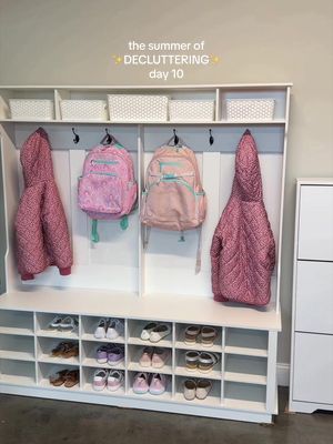 Decluttered our garage and set up a mudroom for us! Our garage needed so much help! We don’t have a coat closet or an actual mudroom in our current house so when we moved in, my plan was to turn the back wall of our garage into a mudroom for us. I wanted a place to store shoes and hang coats and backpacks. I went through all the shoes, coats, and other random things and Austin organized the mess in the front of the garage which was a ton of cardboard, outdoor toys, and some things we needed to donate. The amount of shoes we had is honestly embarrassing 😂 I have such a hard time getting rid of my shoes for some reason (like I have shoes from when I was in college🫠) but I got rid of a ton! And I definitely have more I should probably get rid of. My goal was for this to be round 1 of decluttering and another day I’ll come back and re-visit what’s left to reduce things down more.  And to be fair, both girls are in between shoe sizes so I have a bunch from the size they’re leaving and their new sizes and any shoes that were still in good shape from Emily to pass to Anna.  This setup is so much better and is now a functional space for our family to keep us organized! The girls have somewhere to put their things when they come home from school instead of the floor of our dining room 😂 #declutter #summerofdecluttering #declutterwithme #declutteredhome #declutteringtips 