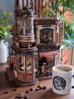 I genuinely didn’t expect a coffee shop kit to be this satisfying to build. ☕️ This is the Dream Coffee Factory kit from ROKR (a Robotime brand). So many tiny individual pieces, and somehow every one clicks into the next like it was made to complete it — more than once I just sat there staring at a finished section thinking, how did someone even design this? 🤔  First time doing a build with this level of detail, and I somehow didn't break a single piece! 😅 I was definitely nervous that all the mechanical parts would throw me off, but everything came together so smoothly. The engineering on it is just incredible.🤌🏻   The lighting, moving mechanisms, miniature coffee cups, tiny characters… there’s so much life in it! Want to build one yourself? Use code MODELKIT for 15% off at rokronline.com. @Rokr_official  #rokr #Robotime #3DPuzzle #ModelKit #Hobby 