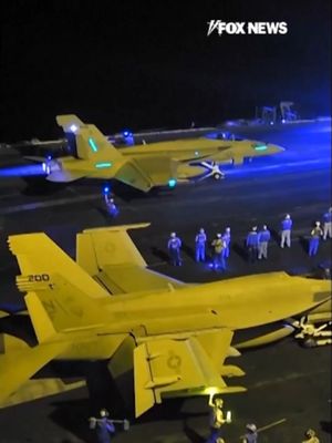 New footage from the U.S. military shows the USS George Washington sailing through the Malacca Strait, launching and landing fighter jets at night in the Indian Ocean. A U.S. official said the carrier is heading to the region as part of a planned replacement for the USS Abraham Lincoln.