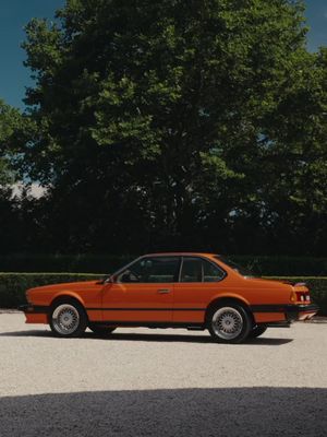 The 1987 BMW M6 E24 by Ronnie Fieg. Presented in Inka Orange, this 1-of-1 car has been fully rebuilt using original BMW components and designed through Fieg’s lens.  The Kith for BMW 2026 collection is available now at Kith shops, Kith.com and the Kith App.  @BMW USA @bmw 