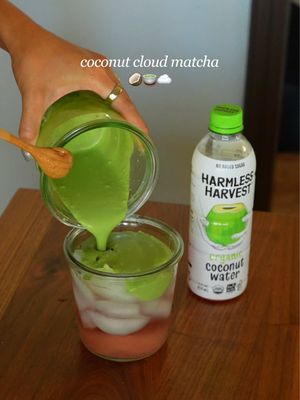 Coconut matcha cloud at home 🍵🥥#harmlessharvest #harmlessharvestpartner Recipe: ¼ cup coconut milk ¼ cup non dairy heavy whip 4g matcha powder Whisk until frothy and thick In a separate glass add ice and ⅓ cup @Harmless Harvest coconut water (or enough to fill ⅔ of the glass)