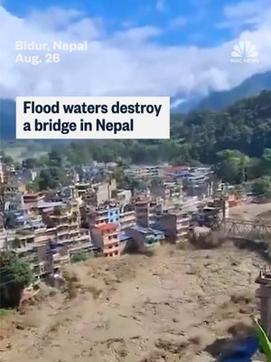Flood waters destroyed a bridge in Nepal as flash floods leave hundreds missing.