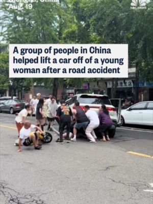 A group of people in China gathered to lift a car off a young women stuck after a road incident.