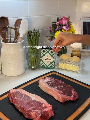 A steaknight dinner for two 🥩❤️ recipe down below⤵️  Instructions: Mashed Potatoes 1. Add potatoes to a large pot and cover with cold water. Season generously with salt. 2. Bring to a boil and cook until fork tender, about 15–18 minutes. 3. While the potatoes cook, melt the butter in a small pan and sauté the garlic for 1 minute until fragrant. 4. Drain the potatoes and return them to the pot. 5. Add the garlic butter, warm milk, salt, and pepper. Mash until smooth and creamy. Cover and keep warm. Steaks 1. Pat the steaks completely dry with paper towels. 2. Season generously on all sides with salt and black pepper. 3. Heat a cast iron skillet over high heat until very hot. 4. Add the avocado oil and place the steaks in the pan. 5. Sear for 3–4 minutes per side, depending on thickness. 6. Lower the heat slightly and add the butter, garlic, rosemary, and thyme. 7. Tilt the pan and continuously spoon the melted butter over the steaks for 1–2 minutes. 8. Cook until the steaks reach your preferred doneness. For medium-rare, remove at 125–130°F. 9. Transfer to a cutting board and let rest for 10 minutes. Asparagus 1. Leave the garlic, herbs, butter, and steak juices in the skillet. 2. Add the asparagus and toss to coat in the drippings. 3. Cook for 4–5 minutes, turning occasionally, until tender-crisp. 4. Season with salt and pepper and finish with an extra tablespoon of butter if desired. Serve 1. Spoon the mashed potatoes onto each plate. 2. Slice the steaks against the grain and place alongside the potatoes. 3. Add the asparagus and drizzle any remaining pan juices over everything. 4. Finish with flaky salt and freshly cracked black pepper.