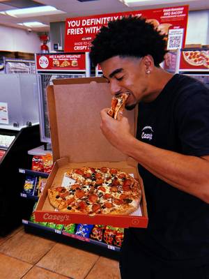 @isaiahsategna is vibin' on casey's game day saturdays bc all pizzas are 40% off
