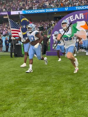 Irelands own Adam McCann Gibbs leads out the Tar Heels 🇮🇪  #MuchMoreThanAGame | #TouchdownDublin | #TouchdownIreland