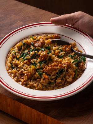 One pot sausage and rice  #Ingredients - 1 onion - 1 carrot - 1 stick celery - 2 cloves garlic - 2 chorizo sausages - 2 tbsp olive oil - ½ tsp smoked paprika - Salt and pepper to taste - 120g (4.2 oz) Arborio rice - 500ml (17 ½ oz) chicken stock - 60g (2.1 oz) baby spinach Method#mMethod 1. Peel and finely dice the onion and carrot, finely dice the celery then set aside. 2. Crush and roughly chop the garlic, then set aside. 3. Slice the chorizo into chunks, (3-4cm thick) then set aside. Step 2 1. Add olive oil to a medium sized saucier. Preheat the saucier on high heat for 30 seconds. 2. Add the onion, carrot and celery, sweat for 2-3 minutes with ½ tsp of salt. Once the onions turn translucent, add the garlic and stir. 3. Add the sliced chorizo and stir into the vegetables. Cook for two minutes or until the fat begins to render out of the chorizo. 4. Add the smoked paprika, ¼ tsp of salt, 12 cracks of black pepper and the rice (no need to rinse the rice). Keep the saucier on the heat to lightly toast the rice for 1 minute. 5. Add the chicken stock and stir, making sure to lift any pieces of rice stuck to the bottom of the saucier. Bring the stock to a simmer then turn the element down to low, place a lid on top and leave for 15 minutes. Step 3 1. Remove the lid and check the rice is soft. If the rice is still firm, place the lid back on and leave on low heat for a further 5 minutes. 2. Remove the lid, turn the heat up high and add the spinach. Place the lid back on for 60 seconds. Remove the lid, stir the rice and cook for a further 60 seconds. 3. Taste the rice and adjust seasoning if required. Plate and enjoy.