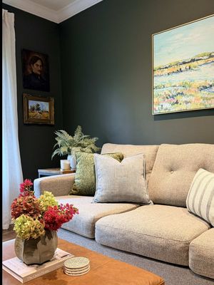 BEHR just released their 2027 Color of the Year, Grounded! Available exclusively at The Home Depot, Grounded is a sophisticated olive green that brings the outdoors in, making any space feel calm and inviting.  I was so excited to use Grounded to help transform my neighbor, Austin’s den! The rich green instantly transformed the space. Grounded is a part of BEHR’s One-Coat Hide Collection which makes painting easy and stress-free with its advanced stain blocking and durability. We also painted the ceiling Coastal Beige from BEHR’s Trend Palette/Designer Collection to give it a fresh new look.  As we brought back in the furniture and new decor, we couldn’t forget the sixth wall in the room, the floor! Inspired by @BEHRpaint’s Color of the Year, We selected the Maribel Green Indoor Area Rug from Home Decorators Collection, found exclusively at The Home Depot, which added a layer of femininity and pattern to the room. Can you believe this 48-hour transformation? Austin is so in love with the space and looks forward to lounging, working, and enjoying this newly-Grounded room for years to come!  Comment GROUNDED to see all the @HomeDepot products we used for this project! #HomeDepotPartner #THDBEHR #BEHRpaint 
