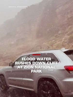 Video shows water rushing down a cliff at Zion National Park in Utah on Monday after heavy rains triggered flash flooding.
