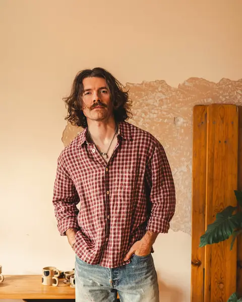 By sheer dint of my persistence in showing up fully clothed online and writing about it, I’m given a lot of free clothes. That’s nice, because it frees up my ill-gotten pocket money for more extravagant purchases from small businesses who support small makers who support small factories who produce really, really nice fabrics. Take this Farmer’s Shirt — bought at Goodies in Oxford, made by Conkers in the UK, using an Irish dishcloth linen from Emblem Weavers. It’s lovely.