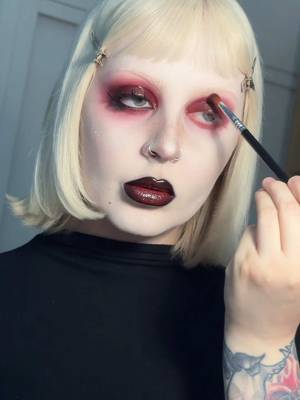 Red glossy eyes 🥀💦  Full product list: @Rituel de Fille Black orb “iron” + @Blend Bunny Cosmetics Rotten eyeshadow “marrow” + @Black Moon Cosmetics Lip Pencil “null” + @about-face Eye Vinyl + @likely makeup lashes “switchblade” #vampymakeup #vampiremakeup #fallmakeup 