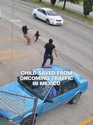 Security camera footage shows the moment a supermarket worker narrowly saves a child who ran into traffic in Puebla, Mexico.
