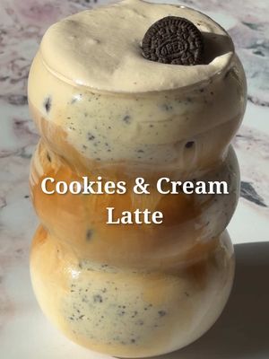 I saw this creamer and spread at target and I had to try it ☕️☁️ Cookies & Cream Latte 3 tbsp heavy cream 2 tbsp cookies & cream creamer Milk of choice Double shot of espresso Cookies and cream spread for the inside of the glass. In a mixing glass, combine the heavy cream and cookies and cream creamer, then use a hand frother to mix. In a glass, spread cookies and cream on the inside, fill with ice, pour in your milk of choice, and top with a double shot of espresso. Garnish with a mini Oreo cookie. #latte #cookiesandcream #icedlatte