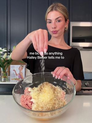 But of course with my tipsy tomato sauce 😉 Hailey Bieber meatballs but with my own little tweaks ⬇️ Meatballs 1 lb ground chicken 1/2 cup cottage cheese 3/4 cup panko breadcrumbs 1/2 cup grated Parmesan 1 large egg 1 tsp Italian seasoning 1/2 tsp garlic powder 1/2 tsp salt 1/4 tsp black pepper Olive oil, for cooking Vodka Sauce 2 tbsp olive oil 2 tbsp butter 1/2 tsp red pepper flakes 1/2 cup vodka 1 (28 oz) can crushed tomatoes 1/2 cup heavy cream 1/2 cup grated Parmesan Salt and black pepper, to taste For serving Grated Parmesan Red pepper flakes Fresh basil 1.	Add the ground chicken, cottage cheese, panko, Parmesan, egg, Italian seasoning, garlic powder, salt and pepper to a bowl. Mix gently until just combined. 2.	Roll into meatballs 3.	Heat a drizzle of olive oil in a large skillet over medium heat. Add the meatballs and cook, turning occasionally, until golden on all sides and completely cooked through to 165°F, about 10 to 12 minutes. Transfer the meatballs to a serving plate. 4.	In the same skillet, add the olive oil, butter and red pepper flakes. Cook for about 30 seconds. 5.	Add the vodka and simmer for 2 to 3 minutes. 6.	Stir in the crushed tomatoes, season with salt and pepper and simmer for about 5 minutes. 7.	Lower the heat and stir in the heavy cream and Parmesan until the sauce is creamy and smooth. 8.	Spoon the warm vodka sauce generously over the cooked meatballs. 9.	Finish with more grated Parmesan, red pepper flakes and fresh basil #haileybieber #meatballs #EasyRecipes 