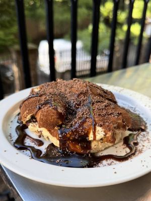 Sticky toffee banana bread tiramisu Banana bread 150g unsalted butter, softened 180g light brown sugar 3 eggs 290g ripe banana, mashed 275g self-raising flour 150g dark chocolate, chopped Mascarpone filling 500g mascarpone 50ml coffee liqueur 6 eggs, separated 120g caster sugar 300ml double cream Sticky toffee sauce 150g butter 200g dark muscovado sugar 250ml double cream 1 tbsp black treacle pinch of sea salt  300ml strong coffee, cooled 60ml coffee liqueur Cocoa powder Dark chocolate 1. Start with your banana bread. Heat oven to 170°C fan. Beat the butter and sugar until pale and fluffy, then beat in the eggs one at a time. Fold through the mashed banana, flour and chocolate. Spoon into a lined rectangular tin and bake for around 30–35 mins until cooked through. Cool completely. 2. While it bakes, make the sticky toffee sauce. Add the cream, butter, sugar and black treacle to a pan and simmer for 3–4 mins until smooth and glossy. Add a good pinch of sea salt and leave to cool.  3. Whip the mascarpone with the coffee liqueur until soft. Whisk the egg yolks with the sugar until pale and fluffy before folding through the mascarpone. Whisk the egg whites to soft peaks and gently fold through, followed by the softly whipped cream. 4. Mix the cooled coffee with the coffee liqueur. 5. Thinly slice the cooled banana bread and soak in the coffee mixture. Layer with mascarpone filling, sticky toffee sauce and a dusting of cocoa, then repeat. 6. Chill until set, then finish with shaved dark chocolate and plenty more sticky toffee sauce. More in detailed breakdown on Substack soon!
