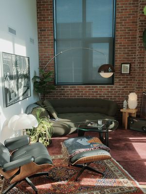 welcome  • • #interiordesign #apartmentdecor #homedecor #homeinspo #homebody • • mid-century modern | toronto interior | brick loft living | warm light | lived-in spaces | hard loft | tall ceilings | large windows | natural light | vintage furniture | statement lighting | plants | architectural details | open living | modern apartment | home atmosphere | interior styling | design focused | quiet spaces