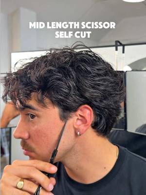 Mid length scissor self cut ✂️  Been growing it out for the last couple months to get to this point and maintenance cuts are key to this. Leave-in-conditioner from @BASED #Basedpartner to keep the volume down.  #wavyhair #selfcuts #scissorcuts #menshair 