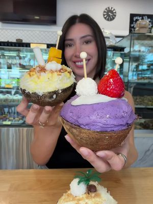 🔥NEW COCONUT SHELL CAKE DESSERT IN HOUSTON🔥  📍 @Suzies Pastry shoppe has alllll the desserts you can think of 😍 They just released their newest dessert which is their cocolicious. It’s a cake inside a real coconut shell with 6 different flavors: mango, ube, tres leches, matcha strawberry, piña colada, and Dubai chocolate!  They also have the famous fruit-shaped desserts and i loved the mango, pistachio, strawberry, and pumpkin pie. They specialize in Mediterranean and European-inspired desserts, and there is seriously something for everyone!  Be sure to check them out!  📍 Suzie’s Pastry Shoppe 8619 Richmond Ave, Suite 800 #houstondesserts #houstontx #thingstodoinhouston 