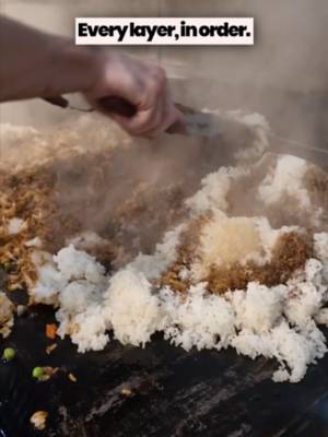 Watching a bowl get built from the base up shows the care that goes into every daily order. 🌾 We hand-bread our chicken in small batches and layer each ingredient fresh right on the assembly line. 🍗 No hidden tricks or pre-packaged fast food shortcuts just real flavor prepared with a genuine human touch. ✨ Get your favorite bowl delivered fresh with zero markup fees via bowlsofrice.com. #bowlsofrice #bowlsofricetexas #democracy #planotx #legacywest