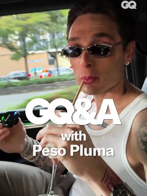 The best way to ride to a fashion show: in an Escalade, with #PesoPluma, sipping a Hugo Spritz. 🍹 GQ hopped in the car to ride to #Luar with the singer-songwriter, and got the scoop on his personal style along the way. Read the full interview at the link in bio.