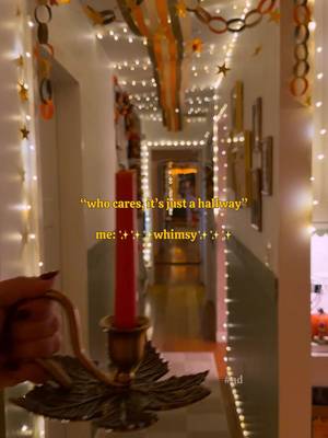 #ad Taking my hallway from boring to whimsy for my fall party!! I wanted it to feel like a magical, twinkling FUN moment that feels like it doesn’t take itself too seriously - I used @Command Brand Hooks to add twinkle lights, hang paper chains and streamers! It came out sooo cute! Do you think i need to add more lights? #commandbrand