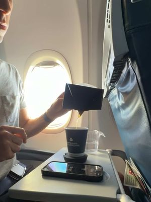 Making coffee on an airplane with the @TIMEMORE new Chestnut S5 Pro hand grinder and Black Mirror Dot scale. I have loved integrating these two products into my travel workflow. The S5 Pro is one of the most capable hand grinders I’ve ever used and yet still so compact that it works great for travel. The Dot is truly the perfect travel scale. It is incredibly small, weighs only 50g, and yet when paired with the app allows for a full range of functionality like pour over mode, espresso mode, live flow rate and more. Products like the S5 Pro and Dot scale make making great coffee anywhere—even an airplane—super easy! #timemore #timemorecoffee #timemoreproducts #pullandpour