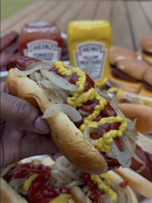 Party ribs, cheeseburgers, beef sausage dogs and caramelized onions for game day. Heinz Mustard went on the party ribs as my binder, and @heinz Simply Ketchup became the base for my homemade BBQ sauce before both came back for the burgers and dogs. An easy mindful swap with that unmistakable thick and rich Heinz taste.  It has to be Heinz. #HeinzPartner