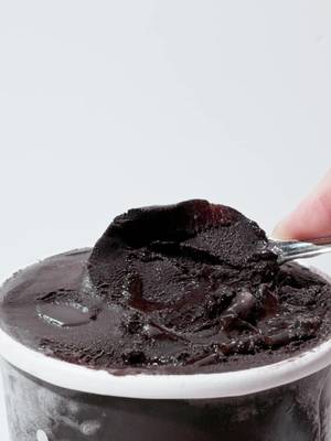 We call Opaque an excavation of flavor because of the way the balsamic cherry jam and espresso fudge almost disappear against the deep black of the ice cream. A lack of visual cues means tapping into the other senses to discover each layer of taste and texture.. #IceCream #ChocolateIceCream #Opaque #DessertTok #NowScooping 