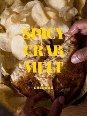 SPICY CRAB MELT. Spicy Creamy Meaty Lump Crab Mixture with Smoked Cheddar on Garlic Butter Sourdough Cooked until Melty and Perfect. Ofc Salt & Vinegar chips is a non negotiable. Full recipe will be on my substack 🫶🏾