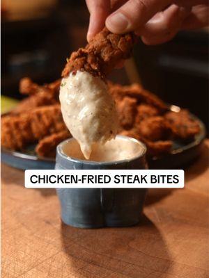 Chicken fried steak bites recipe with homemade country gravy 🤌  Basically chicken fried steak made for dipping. #chickenfriedsteak #countrygravy #steakbites #comfortfood 