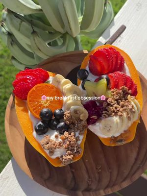 Papaya paradise boats!! Sweet juicy papaya, creamy vanilla bean yogurt, and your favorite toppings- all tucked into an edible bowl of tropical paradise! 🍓🍊🍍🍌🥭🥥It’s refreshing, nourishing, easy on digestion and the kind of breakfast that makes you slow down and enjoy every bite-and we all need more of that, don’t we!  Papaya is a lovely choice when you want something light and satisfying: it has fiber to support regular digestion, lots of water, and papain, a natural enzyme that helps break down protein. Pair it with yogurt for a creamy contrast pack of protein and added digestive enzymes, then add fruit, granola, or whatever you love for extra vitamins, texture and taste explosions with every bite! So easy to make, and almost too pretty to eat! Use any yogurt you love! I love making my own dairy-free vanilla bean yogurt- If you’d like the recipe let me know in the comments! #papaya #papayaboat #healthyrecipes 