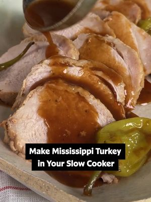You might never want turkey another way after trying this recipe. 👀🧡 Slow Cooker Mississippi Turkey Breast is made with boneless turkey breast, ranch seasoning, au jus, a stick of butter, and tangy pepperoncini; turn the cooking liquid into an easy gravy and spread over mashed potatoes! 😋 Scroll down or tap the link in our bio for full recipe details. ⤵️ Ingredients: 3 to 4 pounds boneless turkey breast 1 (1 ounce) packet au jus mix 1 (1 ounce) packet ranch seasoning mix 8 pepperoncini peppers 3 tablespoons pepperoncini brine from the jar 1 stick butter 2/3 cup cold water 2 tablespoons flour Directions: Place turkey breast into the slow cooker and sprinkle with au jus and ranch seasonings. Add pepperoncini along with 3 tablespoons brine from the jar. Place the stick of butter on top. Cover and cook on Low for 7 to 8 hours or on High for 4 to 4 1/2 hours. Remove turkey breast from the slow cooker and set aside to rest for 10 minutes before slicing. Meanwhile, use a small strainer or slotted spoon to remove any large floating bits from the liquid. Whisk together cold water and flour until smooth. Stir flour mixture into the slow cooker liquid until well incorporated. Cover and cook on High until gravy has thickened, 10 to 15 minutes. Serve turkey with gravy and peppers from the slow cooker. 🎥: Nicole @nicolesperfectbite #mississippi #turkey #slowcooker #pepperoncini #EasyRecipes #fall #cooking