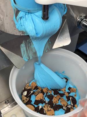 This scoop is bringing all the cookie goodness 💙🍪🍦 Go #BehindTheScoop with Blue Monster, where blue vanilla ice cream is packed with OREO® Cookies and CHIPS AHOY!® Cookies.