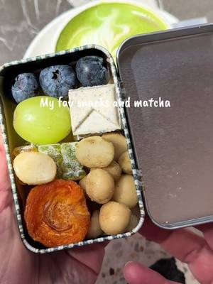 The viral mini snack tin trend had me making my own 🤎🤍 A little bit of everything for my matcha & coffee shop moment ☕️✨ Dried apricots, blueberries, @Australian Macadamias , a cookie and cream chocolate, grape and gummy bears  What would you put in your mini snack tin? 👀 . #trendingfood #snack #snacks #viral 