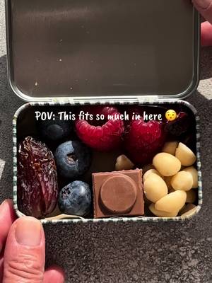 Third mini snack tin… I clearly have a problem 😂🤏 🫐 3 blueberries 🍓 2 raspberries 🤎 1 date 🍫 chocolate 🥜 @Australian Macadamias  ❤️ 3 dried cranberries What would you put in yours? 👀👇 #minisnacktin #snacktin #snacktok #snackideas #minisnacks 