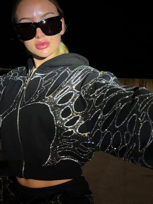 Black rhinestone sweatsuit: plush, all black, and covered in rhinestones 🖤 The cool-girl fall outfit that makes comfy streetwear feel like the whole look. Pre-order at icaruswick.com