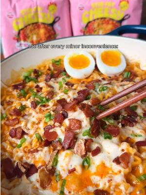 loaded cheesy ramen 🌶️🧀 if you love ramen, you need to try this 😩 this takes a regular packet of ramen and turns it into the creamiest, cheesiest, spicy little bowl of goodness. the crispy bacon + fried onions on top make it even better! ♡ pan fry your bacon until crispy, then remove and set aside. leave the bacon grease in the pan because that’s where all the flavor is! ♡ add 1 minced garlic clove and sauté for about 30 seconds until fragrant. ♡ add about 1/3 cup noodle water and some heavy cream. ♡ add the ramen seasoning packets. stir everything together until the sauce is creamy and smooth. ♡ add your cooked ramen noodles back into the sauce and toss until every noodle is coated in that creamy, cheesy sauce. ♡ top with crispy bacon, crispy fried onions, cheese and green onions! add a soft-boiled egg on top for an extra little bit of yum 🤭 i’m using @Slurp with OTOKI cheesy chili & cheddar ramen and the flavor is soooo good loaded up with crispy bacon, fried onions, extra cheese and green onions 😩🌶️🧀  #cheesyramenpartner #ramenrecipe #cheesyramen #spicyramen #ramenhack