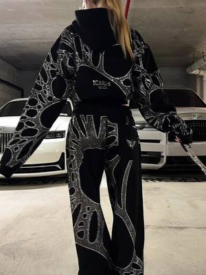 Black rhinestone sweatsuit 🖤 Plush, all-black, and covered in crystals that catch the light. The cool-girl fall outfit you’ll want to wear everywhere. Pre-order at icaruswick.com