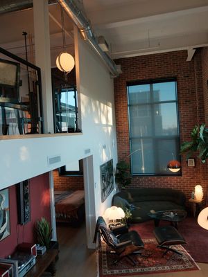 “sorry, I have plans” • • #interiordesign #apartmentdecor #homedecor #homeinspo #homebody • • mid-century modern | toronto interior | brick loft living | warm light | lived-in spaces | hard loft | tall ceilings | large windows | natural light | vintage furniture | statement lighting | plants | architectural details | open living | modern apartment | home atmosphere | interior styling | design focused | quiet spaces