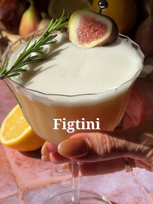 Fall’s prettiest pour 🤎 Figtini 1 tbsp fig jam .75 oz fresh lemon juice .5 oz honey syrup .5 oz orange liqueur 2 oz gin or vodka 1 egg white Add everything to a shaker. Dry shake with no ice, then add ice and shake again. Strain into a coupe glass and garnish with a fig slice and rosemary sprig.  #cocktailrecipes #fallcocktails #falldrinks #fig #figtini 