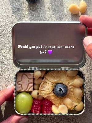 POV: you made a tiny snack box and suddenly snacking is 10x more fun 💜😍 There’s just something about a mini snack tin filled with all your favourite little bites! For this one I went for the perfect mix of fruity, chewy, sweet and crunchy — with a generous handful of macadamia nuts  🍇 1 grape 🥭 Dehydrated mango 🍎 Dehydrated apple 🍍 Dehydrated pineapple 🫐 Blueberries 🍬 Gummies 🤍 @Australian Macadamias  Tiny tin. Big snack happiness. 😂💜 And judging by how much everyone loves these… I think I need to make more! 😍 What would you put in your mini snack tin? . #snacktin #snackbox #snacking #snackideas  #tiktokfood 