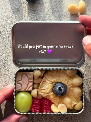 POV: you made a tiny snack box and suddenly snacking is 10x more fun 💜😍 There’s just something about a mini snack tin filled with all your favourite little bites! For this one I went for the perfect mix of fruity, chewy, sweet and crunchy — with a generous handful of macadamia nuts  🍇 1 grape 🥭 Dehydrated mango 🍎 Dehydrated apple 🍍 Dehydrated pineapple 🫐 Blueberries 🍬 Gummies 🤍 @Australian Macadamias  Tiny tin. Big snack happiness. 😂💜 And judging by how much everyone loves these… I think I need to make more! 😍 What would you put in your mini snack tin? . #snacktin #snackbox #snacking #snackideas  #tiktokfood 