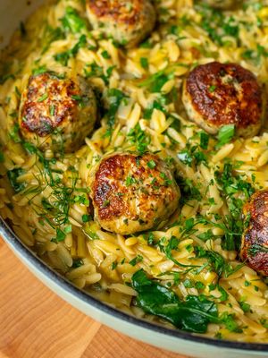 This combination works so well together, I can’t stop making it. When I’m thinking about what to make for dinner, chicken and orzo are always one of my first thoughts. They’re super versatile and always a crowd-pleaser. Here we have a leek-based orzo with a touch of lemon, and Mediterranean-inspired chicken meatballs packed with garlic and fresh herbs. Lemon-Leek Orzo with Herbed Chicken Meatballs: Ingredients For the Chicken Meatballs: ⁠1 lb (454 g) ground chicken ⁠⅓ cup panko breadcrumbs ½ medium yellow onion, finely grated and lightly squeezed of excess liquid 3 garlic cloves, finely minced ⁠2 tbsp fresh dill, finely chopped ⁠2 tbsp flat-leaf parsley, finely chopped ⁠1 large egg, lightly beaten 1 tsp dried oregano 1 tsp kosher salt ½ tsp freshly ground black pepper 3 tbsp extra-virgin olive oil, divided For the Lemon-Leek Orzo: ⁠1 cup (about 200 g) dry orzo 1 large leek, white and light green parts only, halved lengthwise, thoroughly washed, and thinly sliced 2 garlic cloves, minced  ⁠⅓ cup dry white wine ⁠2½ to 3 cups low-sodium chicken broth, warmed ⁠2 large handfuls (about 2 cups / 60 g) baby spinach  ⁠Zest of 1 large lemon Kosher salt, to taste Freshly ground black pepper, to taste For Serving: Fresh lemon juice, to taste Fresh dill, chopped Fresh flat-leaf parsley, chopped Extra-virgin olive oil, for finishing, optional Full recipe is on my website! #orzo #dinneridea #chickenmeatballs #EasyRecipe #yarindanieli  Dinner ideas Easy dinner recipe Orzo recipe Chicken meatballs recipe Easy recipe
