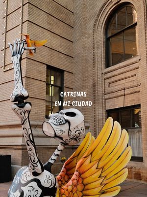 Catrinas en mi Ciudad is a free, immersive outdoor art exhibition in Denver inspired by Mexico's Día de Muertos (Day of the Dead) tradition.  • What it is: Larger-than-life Catrinas, monumental calaveras (skulls), and works by Mexican and Colorado Latino artists. • Dates: October 3 – November 4, 2026 • Hours: Open daily from 7:00 AM to 10:00 PM • Location: The Galleria at the Denver Performing Arts Complex (1400 Curtis St., Denver) • Cost: Free and open to the public. • Special Features: Includes After Light, a new interactive Naming Wall art projection displayed on the Ellie Caulkins Opera House where visitors can project the name of a loved one they wish to honor.  #diademuertos #denver #thingstodo #catrina #latinacontentcreator 