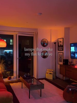 Lighting that makes a home feel like home. Each corner, each glow, each lamp with its own little story. @instagram this is your sign to romanticise your space. #warmlight #midcentury #homedecor #cozycorners #lampstyling interior design, ambient lighting, teak furniture, soft glow, living room inspo, aesthetic home, minimal decor, warm tones, lighting ideas, home styling, mid‑century modern, decor inspiration, flat decor, lamp collection, cozy home vibes@Homesense @Livingandhome UK @H&M HOME @IKEA 